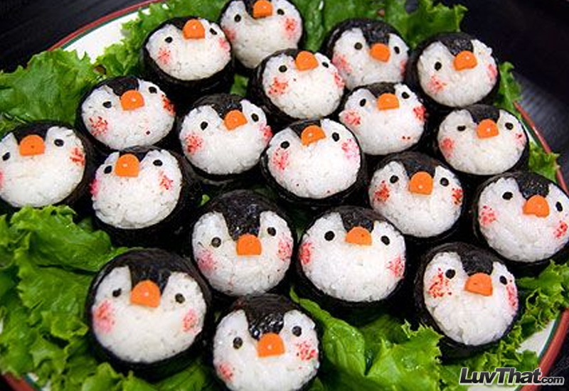 a raft of cute penguins sushi art