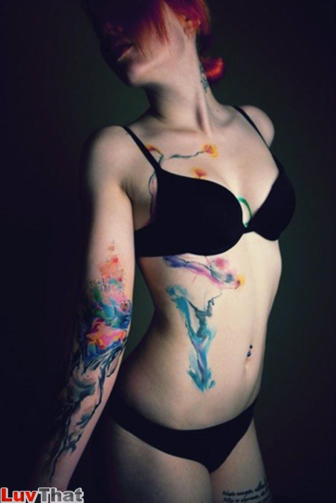 abstract watercolor body tattoo