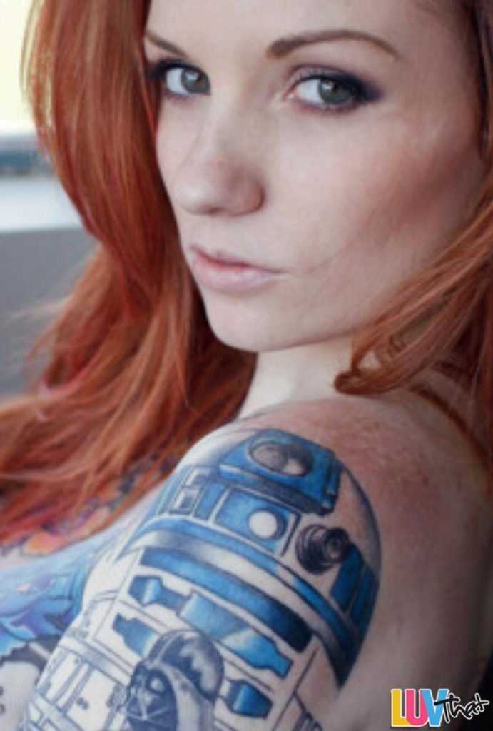 redhead with R2D2 shoulder tattoo