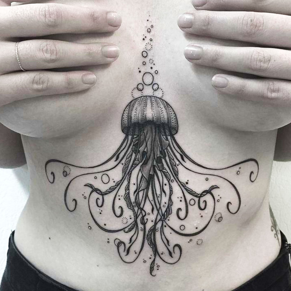 amazing black ink jellyfish tattoo