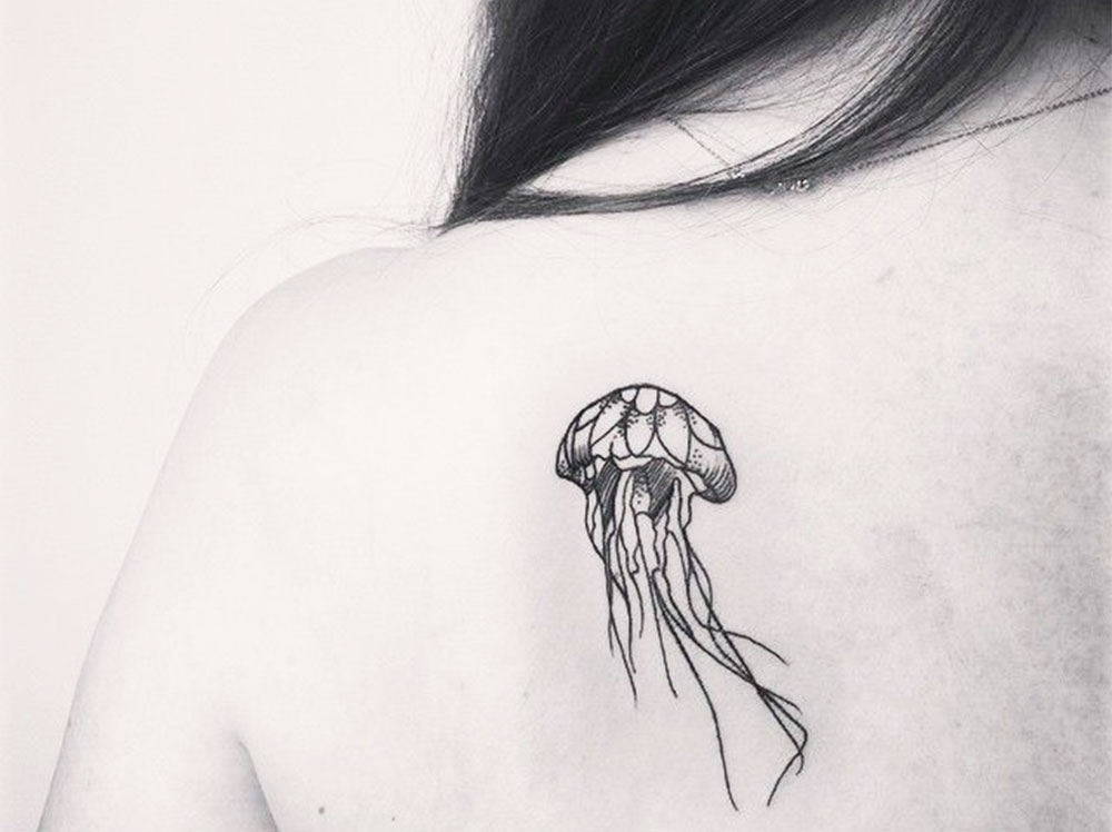cute shoulderblade jellyfish tattoo
