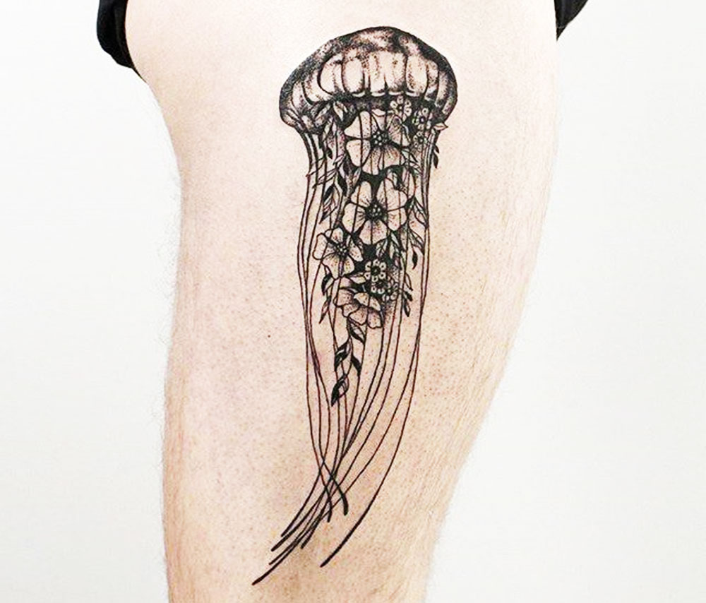 jellyfish with flowers black ink tattoo